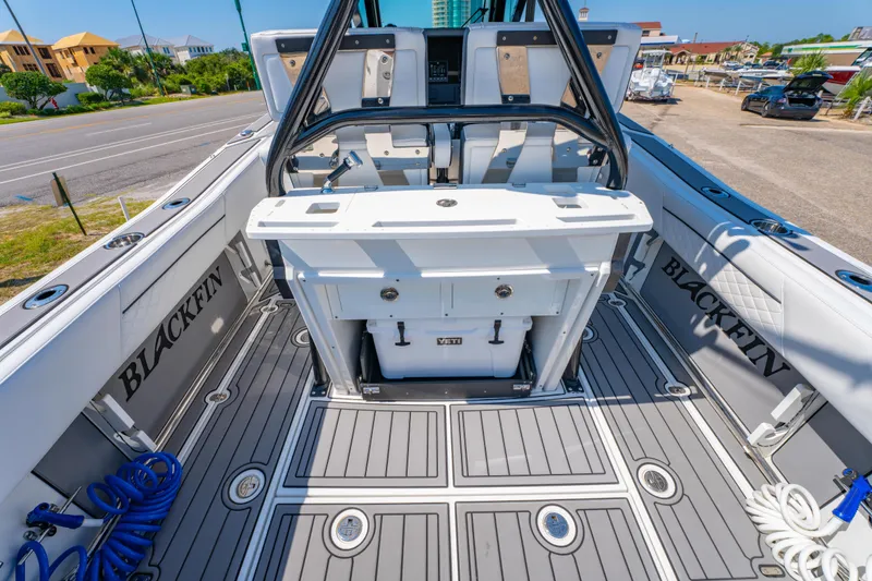 Slide: The Image of 2021 Blackfin 272 CC boat interior with sleek design and modern features. - 12