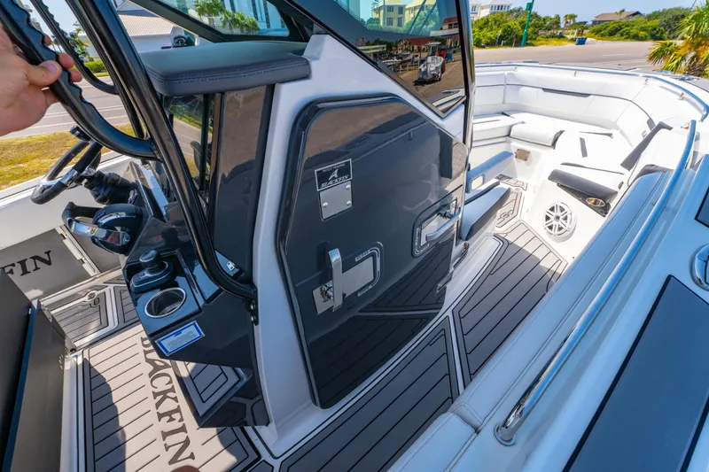 Slide: The Image of 2021 Blackfin 272 CC boat interior with sleek design and modern amenities. - 23