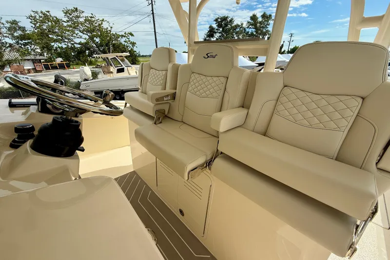 Slide: The Image of 2026 Scout 400 LXF Li-Ion boat interior with modern design and spacious seating. - 11