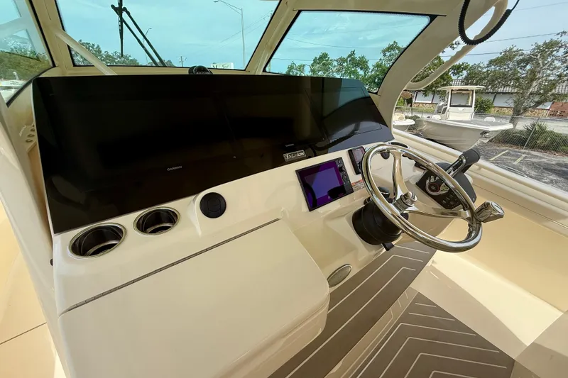 Slide: The Image of Luxurious interior of 2026 Scout 400 LXF Li-Ion boat with plush seating. - 15
