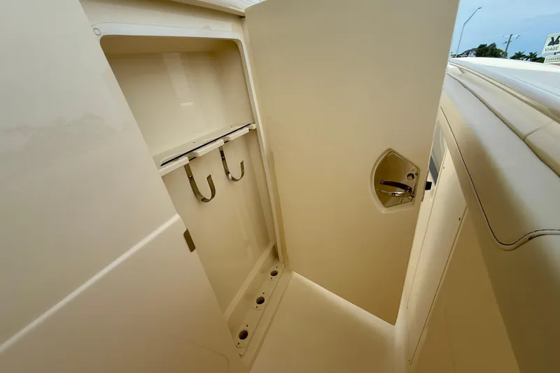 Slide: The Image of Helm of 2026 Scout 400 LXF Li-Ion boat with modern navigation controls and steering wheel. - 17