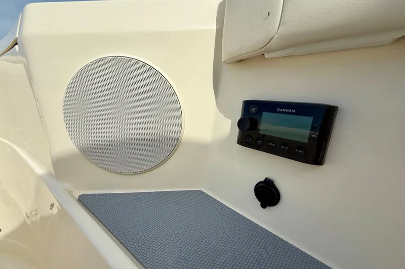 Slide: The Image of Helm of 2026 Scout 400 LXF Li-Ion boat with advanced controls and displays. - 18