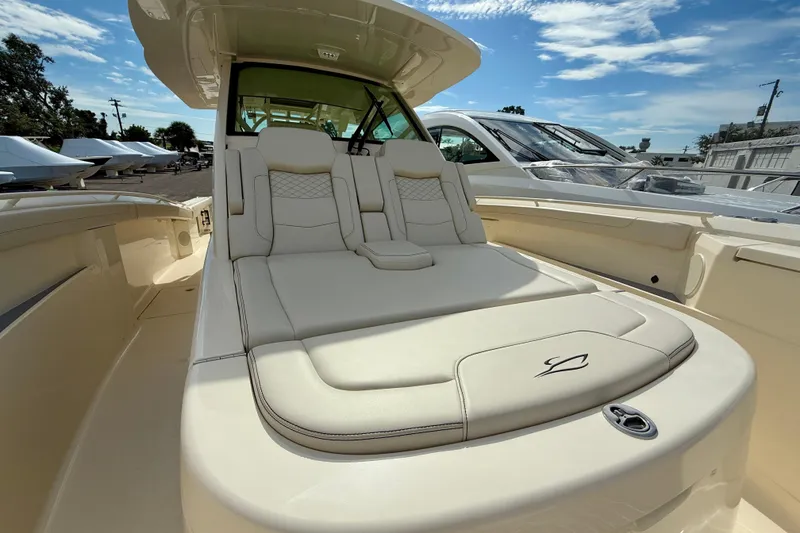 Slide: The Image of 2026 Scout 400 LXF Li-Ion boat helm with modern controls and steering wheel. - 19