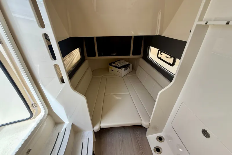 Slide: The Image of Luxurious interior of 2026 Scout 400 LXF Li-Ion boat with plush seating. - 27