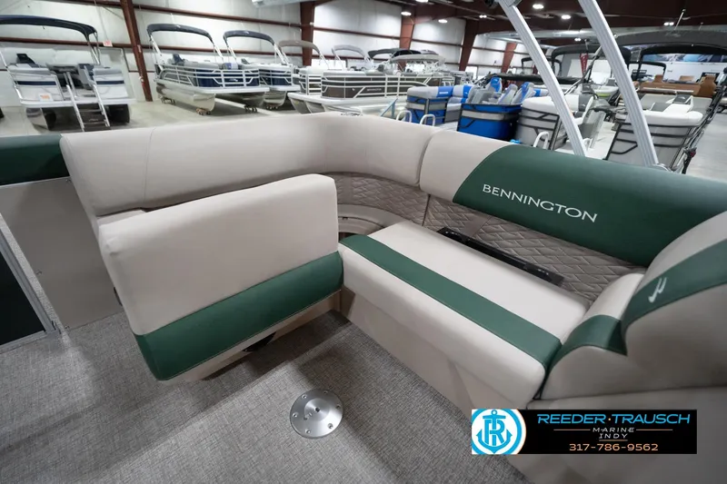 Slide: The Image of Interior of 2026 Bennington 20 SLJ pontoon boat with green and beige seating. - 29
