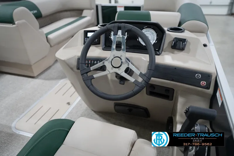 Slide: The Image of 2026 Bennington 20 SLJ boat interior with steering wheel and dashboard controls. - 31