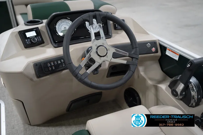 Slide: The Image of Steering console of 2026 Bennington 20 SLJ boat with modern controls and dashboard. - 32