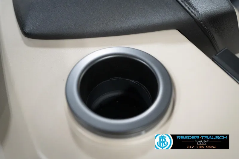 Slide: The Image of Cup holder in 2026 Bennington 20 SLJ boat interior, featuring beige and black design. - 47