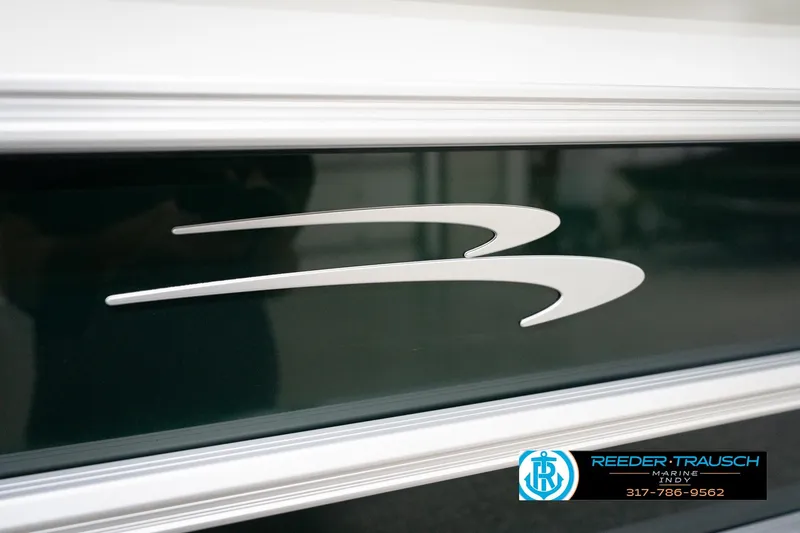 Slide: The Image of 2026 Bennington 20 SLJ boat logo detail with Reeder Trausch Marine contact information. - 49