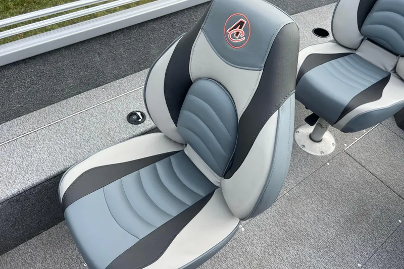 Slide: The Image of 2023 Alumacraft Voyageur 175 SC boat seats with stylish gray and black design. - 22