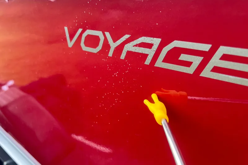 Slide: The Image of 2023 Alumacraft Voyageur 175 SC boat with red exterior and yellow tool. - 54
