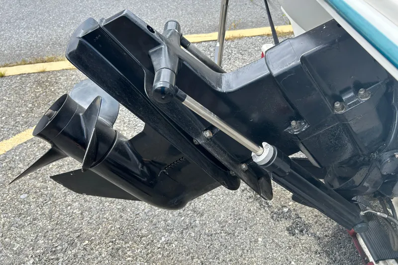 Slide: The Image of Close-up of a 1998 Sea Ray 180 Bow Rider boat's outboard motor and propeller. - 10