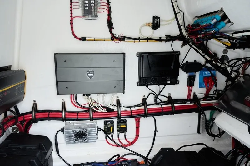 Slide: The Image of Electrical system of 2024 Onslow Bay 33 Tournament boat, showcasing wiring and components. - 16