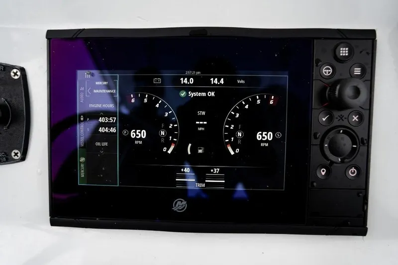 Slide: The Image of Dashboard display of a 2024 Onslow Bay 33 Tournament boat showing engine metrics. - 19