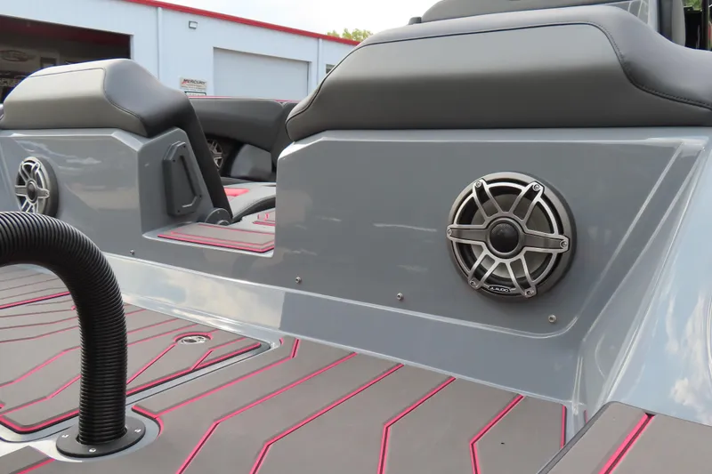 Slide: The Image of 2025 Sunsation 32CCX boat interior with sleek design and modern speaker system. - 11