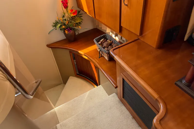Slide: The Image of Interior of 2003 Carver 360 Sport Sedan with wooden cabinetry and decorative elements. - 12
