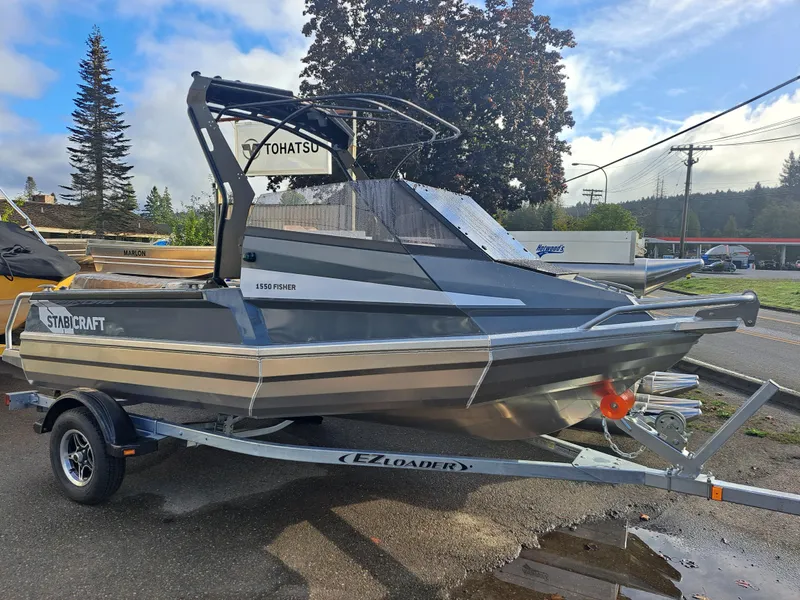 The Image of 2024 Stabicraft 1550 Fisher boat on trailer, parked outdoors. - 0