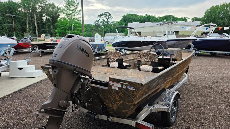 Slide: The Image of 2026 G3 Gator Tough 17 SC boat with Yamaha motor on trailer. - 10