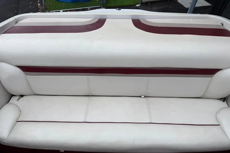 Slide: The Image of White and maroon boat seat of a 1999 Chaparral 1930 SS. - 10
