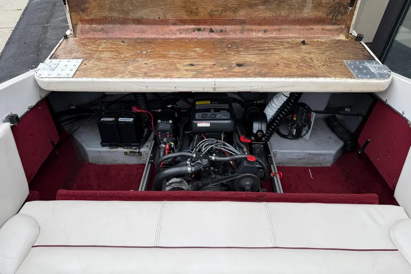 Slide: The Image of Engine compartment of a 1999 Chaparral 1930 SS boat, showcasing a 5.0 FL engine. - 4