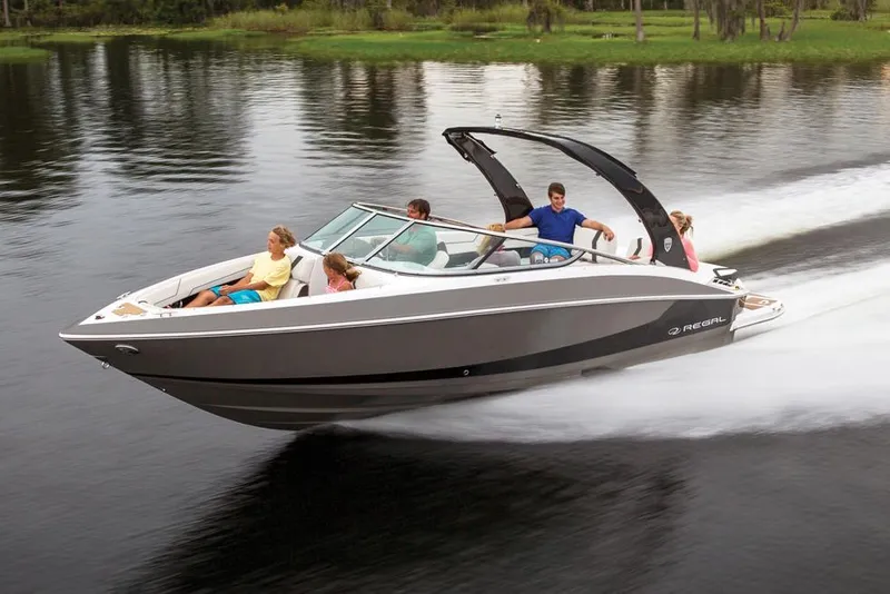 Slide: The Image of Manufacturer Provided Image: 2018 Regal 2500 Bowrider speeding on a lake with passengers. - 14