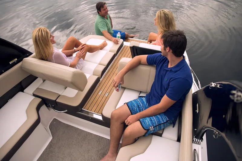 Slide: The Image of Manufacturer Provided Image: 2018 Regal 2500 Bowrider with people relaxing on the boat. - 17