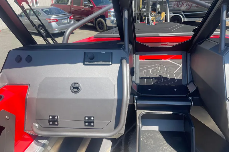 Slide: The Image of 2024 Stabicraft Treker Profish boat interior with modern dashboard and seating area. - 17