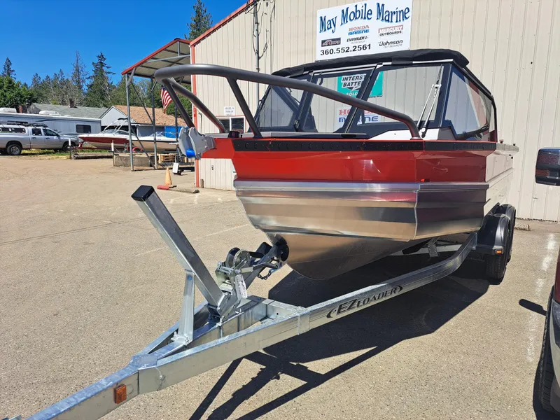 Slide: The Image of 2024 Stabicraft Treker Profish boat on trailer at May Mobile Marine dealership. - 3
