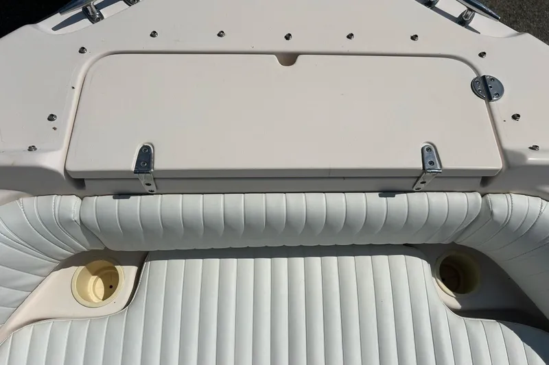 Slide: The Image of 2006 Grady White 225 Dual Console boat interior with white cushioned seating. - 20