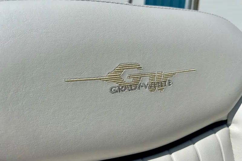 Slide: The Image of Grady White 225 Dual Console 2006 boat seat with embroidered logo. - 28