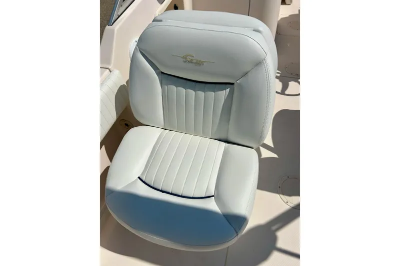 Slide: The Image of White cushioned seat on 2006 Grady White 225 Dual Console boat. - 29