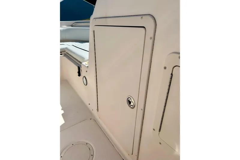 Slide: The Image of 2006 Grady White 225 Dual Console boat interior storage compartment. - 39