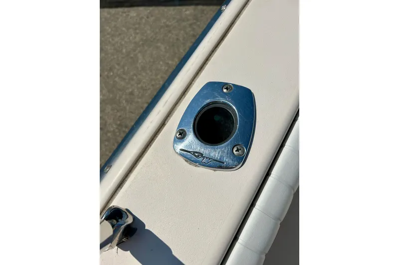 Slide: The Image of Close-up of a 2006 Grady White 225 Dual Console boat's metal fitting. - 43