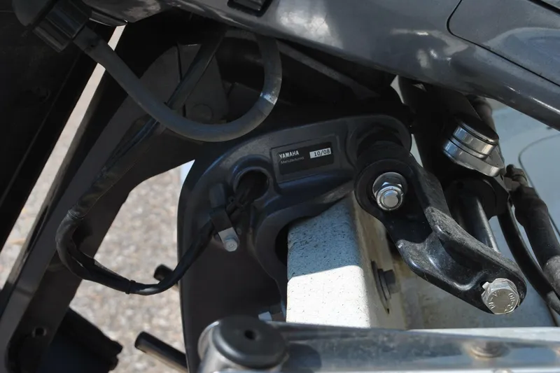 Slide: The Image of Close-up of a Yamaha engine component on a Custom 24 model, year 2009. - 9