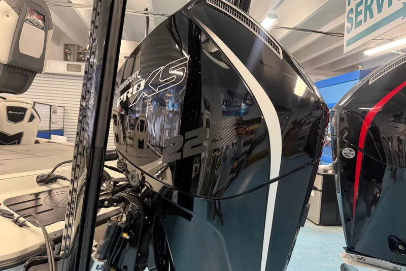 Slide: The Image of 2026 Ranger Z519 boat with Mercury Pro XS engine in showroom display. - 22