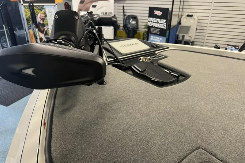 Slide: The Image of 2026 Ranger Z519 boat interior with cushioned seat and sleek design. - 4