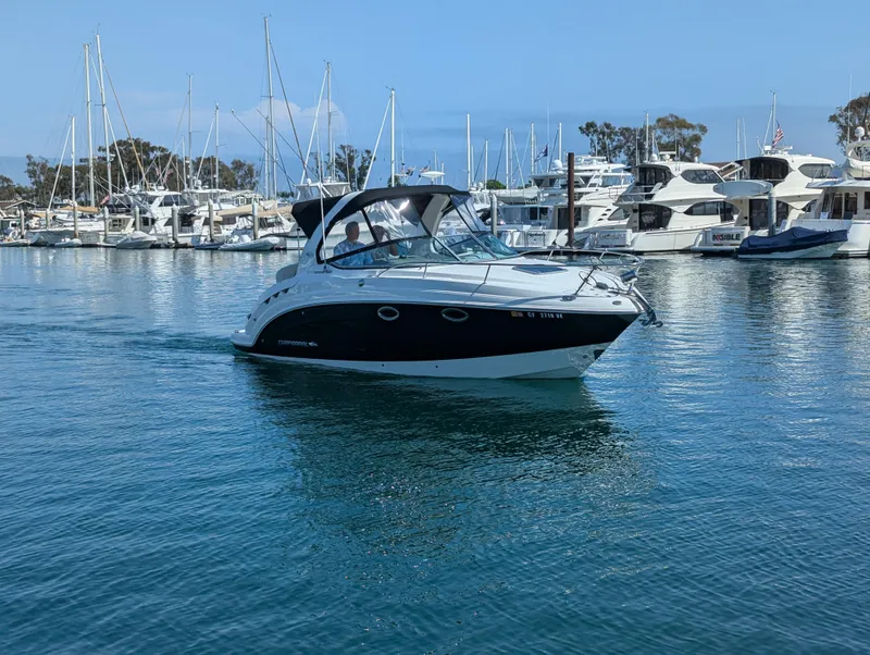 Slide: The Image of 2011 Chaparral Signature 270 boat cruising in a marina. - 4