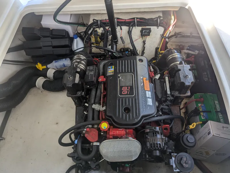 Slide: The Image of 2011 Chaparral Signature 270 engine compartment with well-maintained components. - 41