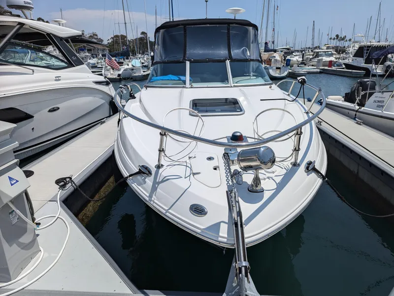 Slide: The Image of 2011 Chaparral Signature 270 boat docked at a marina. - 46