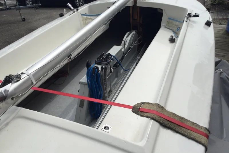 Slide: The Image of Interior view of a 2002 Flying Scot 19 sailboat, showcasing rigging and deck details. - 5