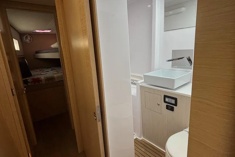 Slide: The Image of Modern bathroom and cozy bedroom in 2022 Seaway 1600 boat interior. - 23
