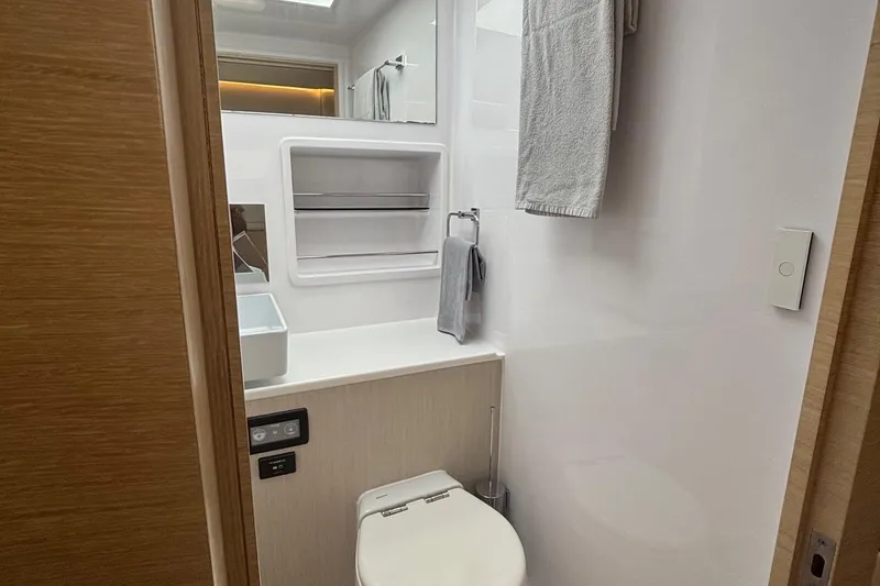 Slide: The Image of Modern bathroom in 2022 Seaway 1600 yacht, featuring sleek design and compact amenities. - 24