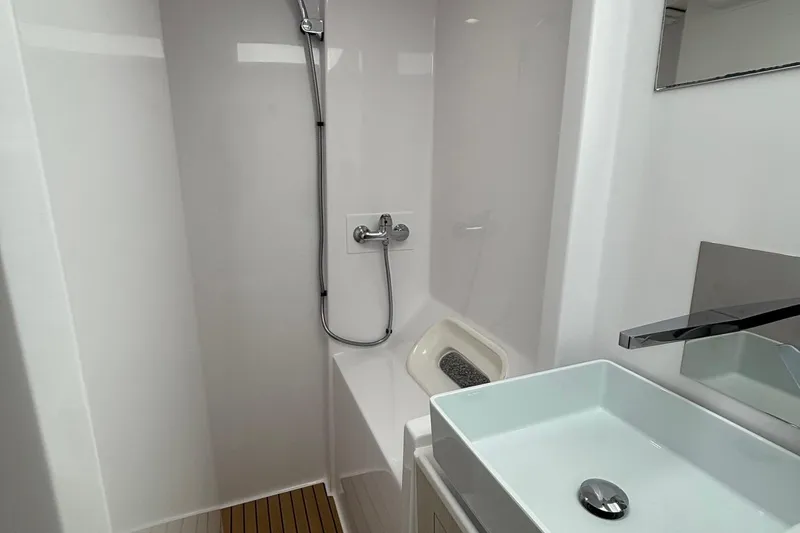 Slide: The Image of Modern bathroom in 2022 Seaway 1600 boat with shower and sleek sink design. - 31