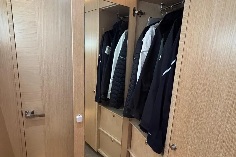 Slide: The Image of Wooden closet with hanging jackets inside a Seaway 1600, 2022 model. - 36