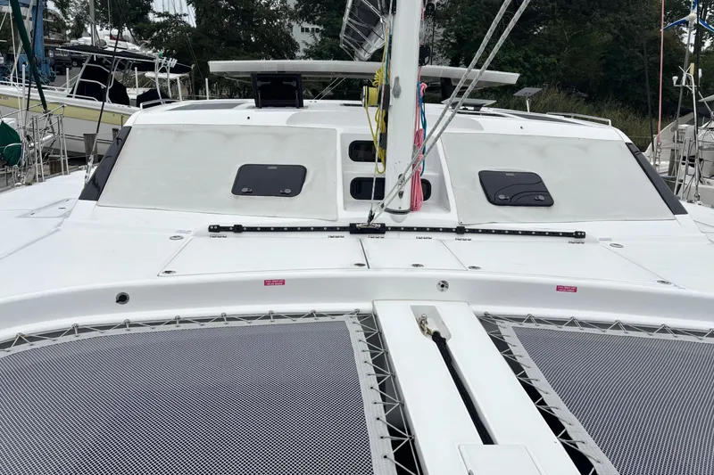 Slide: The Image of 2022 Seawind 1600 catamaran with sleek deck design and modern features. - 51