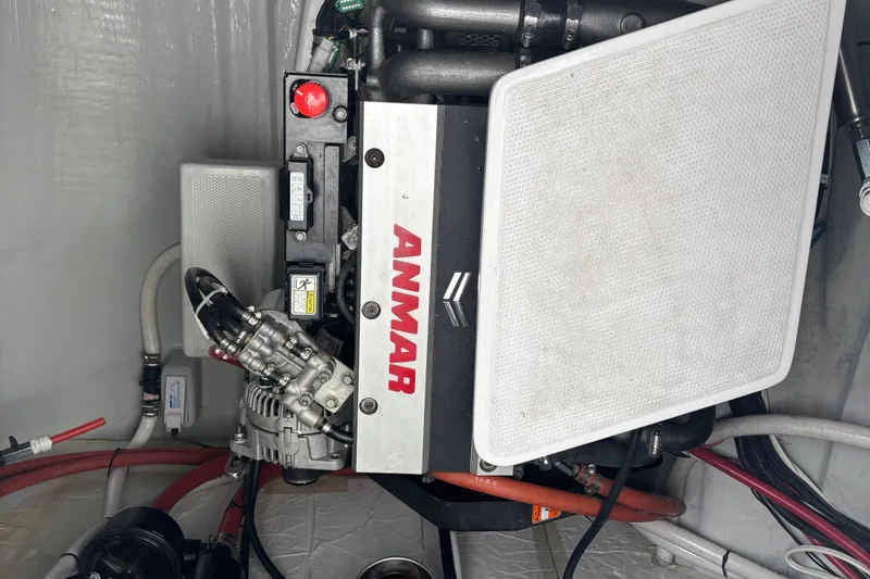 Slide: The Image of Engine compartment of a 2022 Seaway 1600 boat, featuring an Anmar engine. - 57