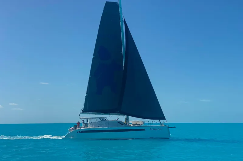 Slide: The Image of Sailing yacht Seaway 1600, 2022 model, gliding on clear blue ocean waters. - 64