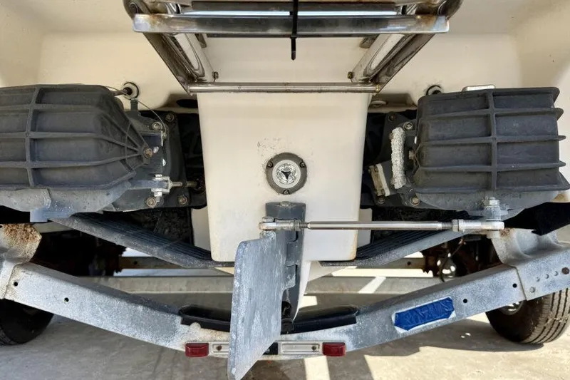 Slide: The Image of Rear view of a 2020 Yamaha Boats AR210 showing dual jet drives and trailer. - 25