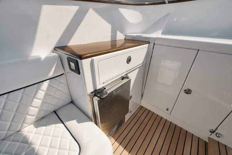 Slide: The Image of Luxurious interior of 2024 Gamefisherman 49 yacht with elegant seating and cabinetry. - 25