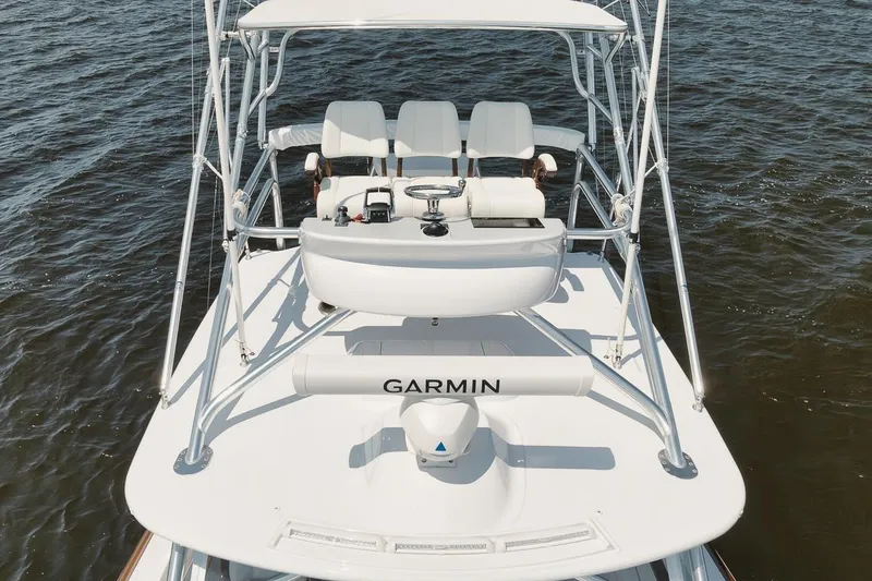 Slide: The Image of 2024 Gamefisherman 49 boat with Garmin equipment on open water. - 32